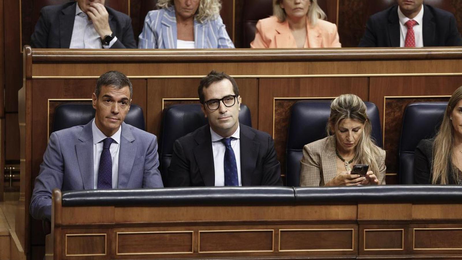 Pedro Sánchez, Carlos Cuerpo y Yolanda Díaz en un pleno del Congreso de los Diputados de este mes.
