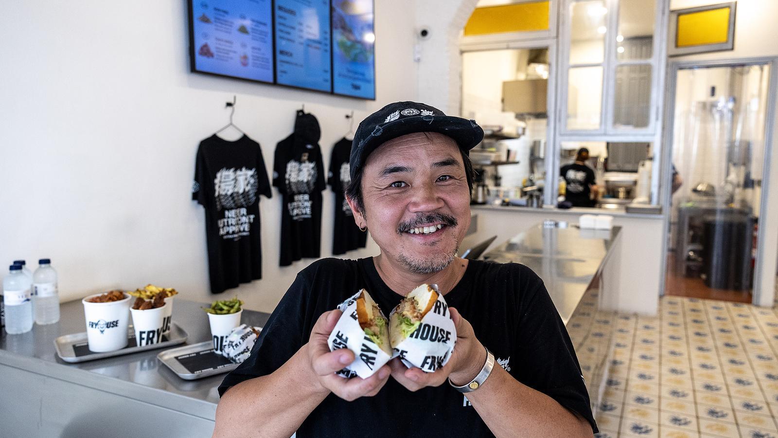 Ken Umehara, known as El Puto Ken, cooks fried chicken burgers at Fry House.