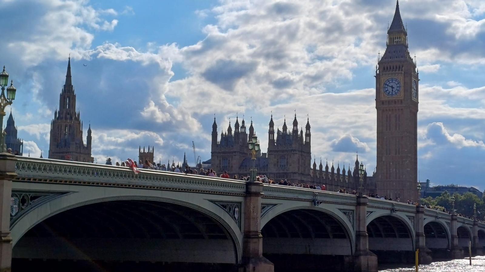 A picture of Westminster Bridge, in the foreground, with Big Ben and the Houses of Parliament in the background