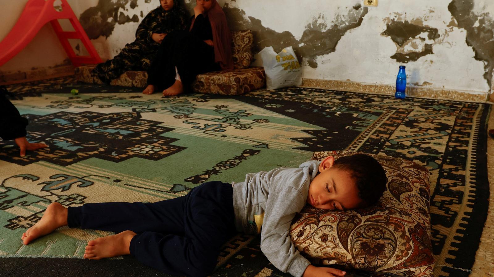 A refugee family at a kindergarten in Khan Younis, on the Gaza border, on Tuesday.