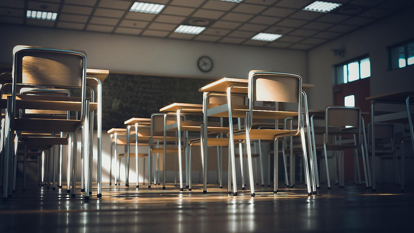 01. A teacher teaching at a secondary school. 02. An empty classroom.