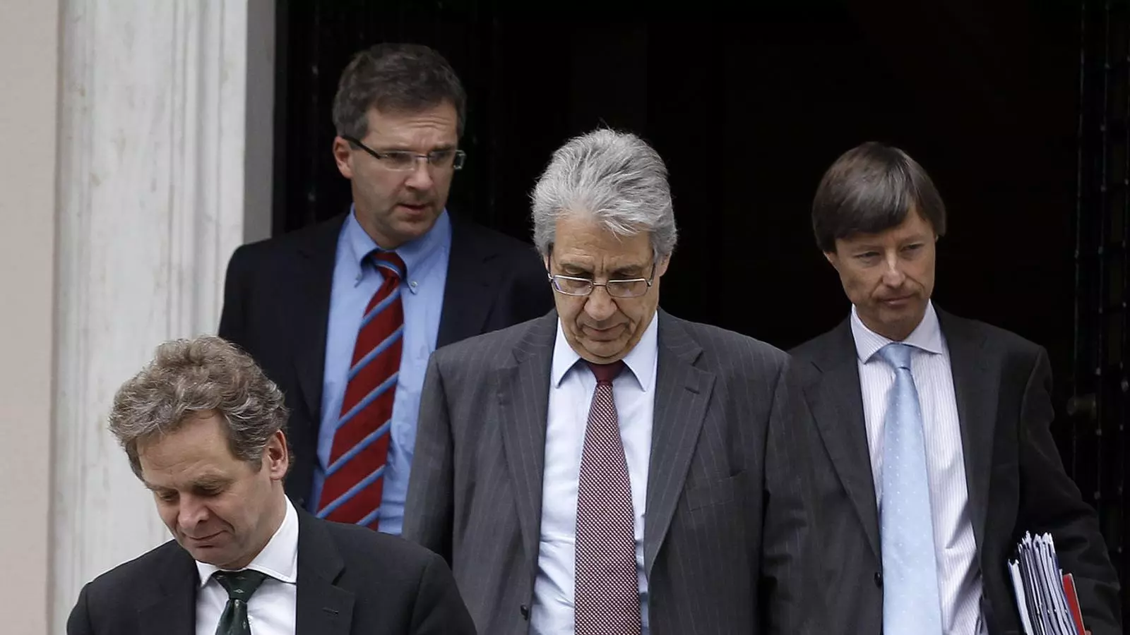 Els membres de la troica que s'ocupa de Grècia (a la foto) viatgen quatre cops l'any a Atenes.