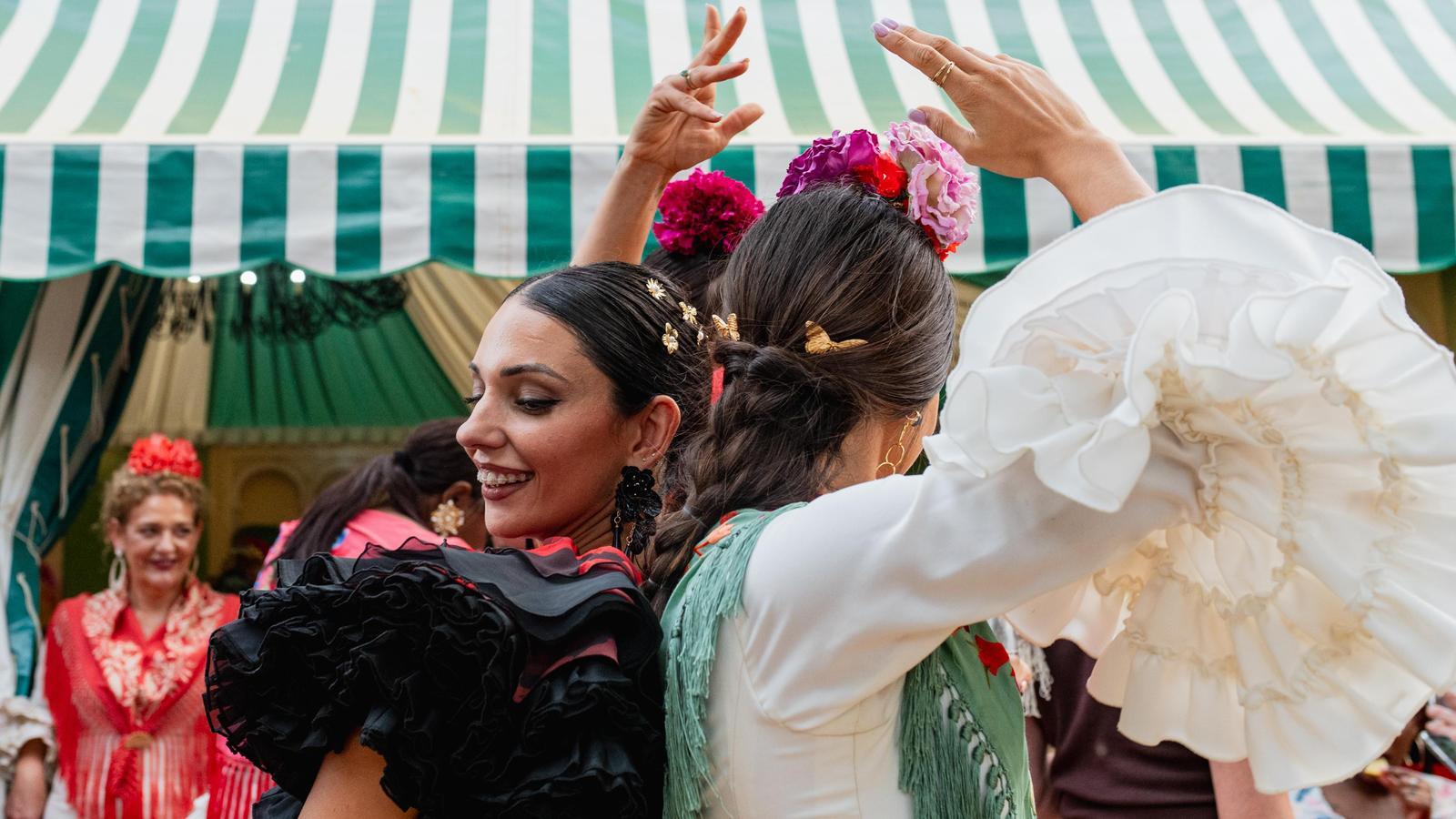20260423 Two women dressed as flamenco dancers, at the April Fair, in Seville