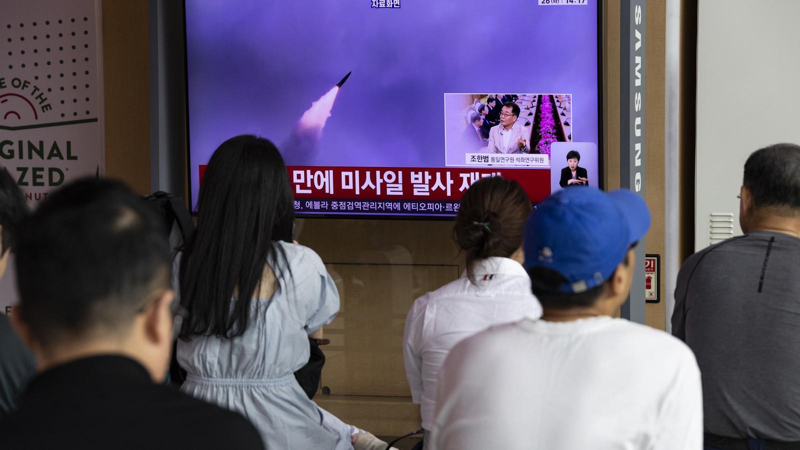 South Korean television reports on missile launches from North Korea.