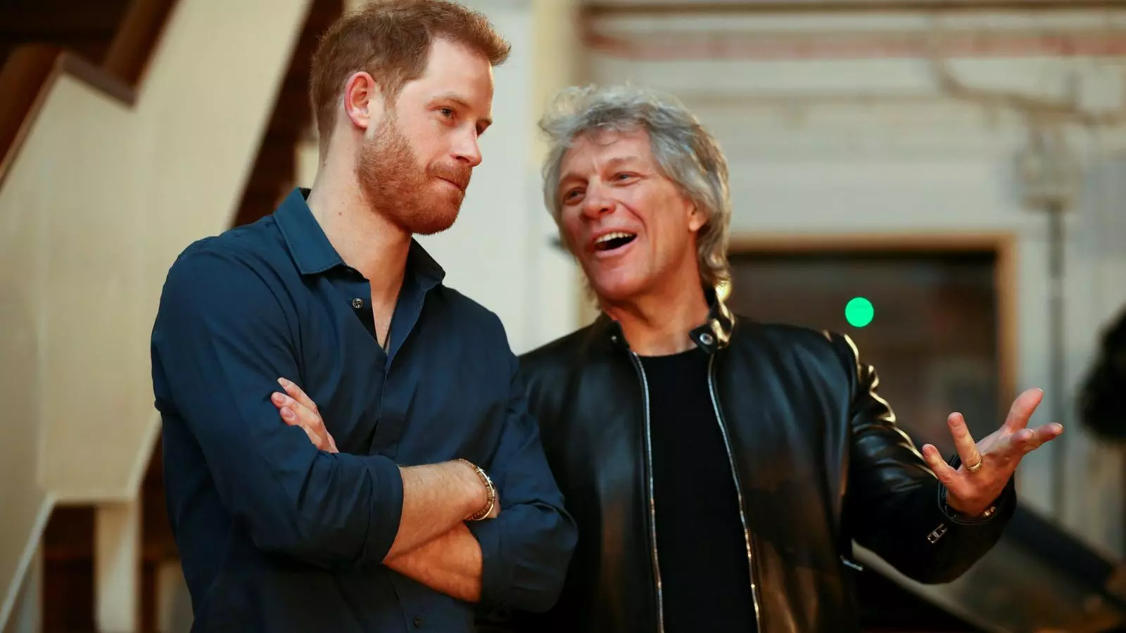 El príncep Enric i Jon Bon Jovi durant la seva trobada
