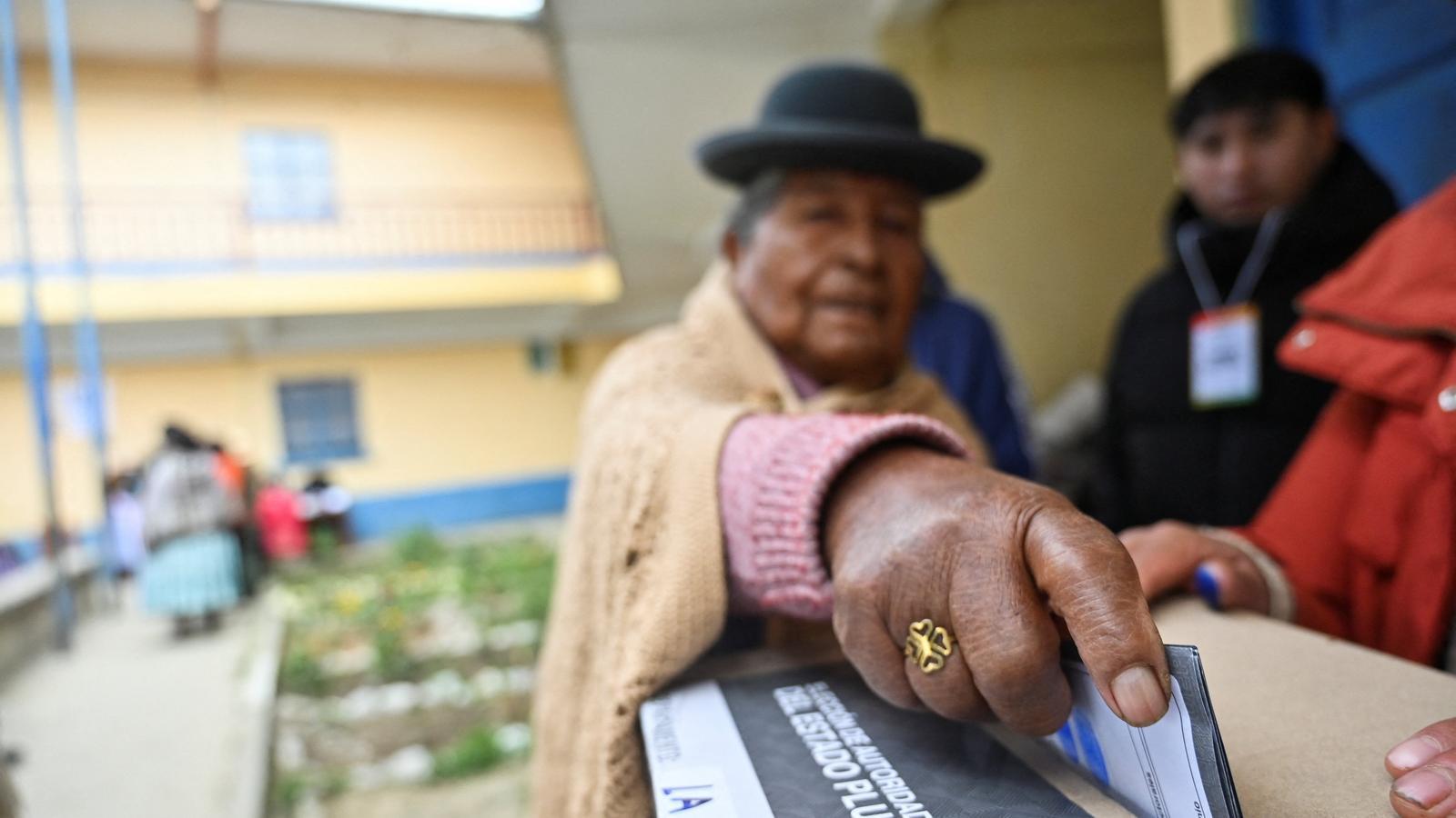 Bolivia elects a new president in an election marked by the absence of Evo Morales.