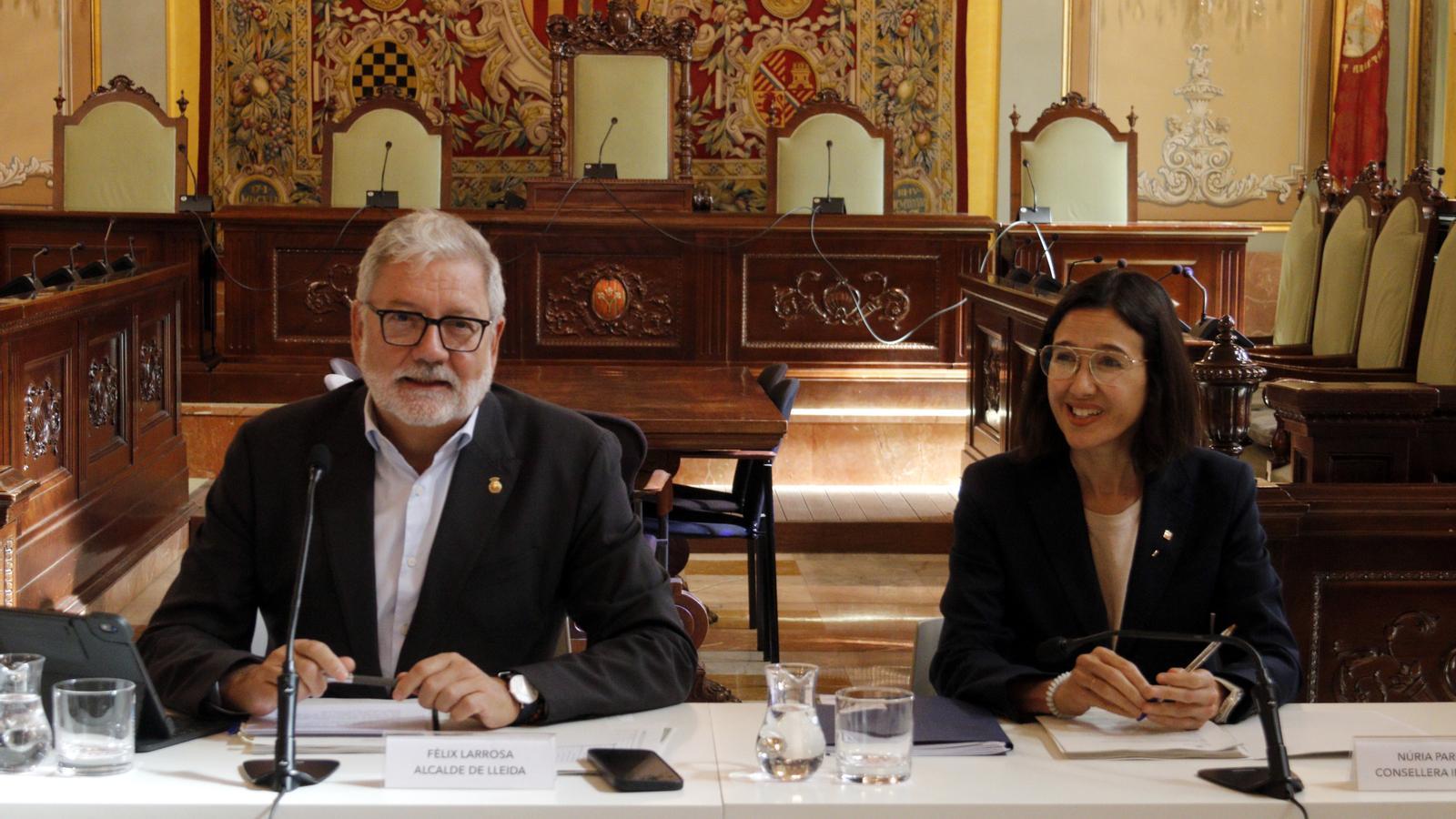 The mayor of Lleida, Fèlix Larrosa, and the Minister of Interior, Núria Parlon, during the meeting of the Local Security Board of Lleida.