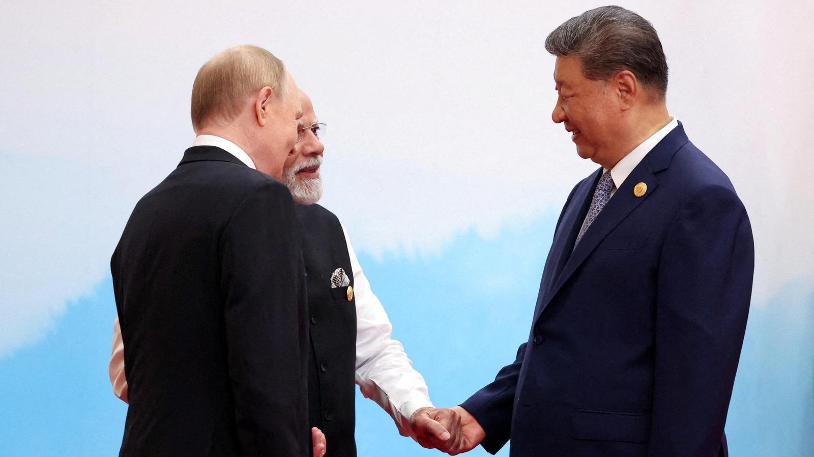 Vladimir Putin, Narendra Modi and Xi Jinping at the SCO summit in China.