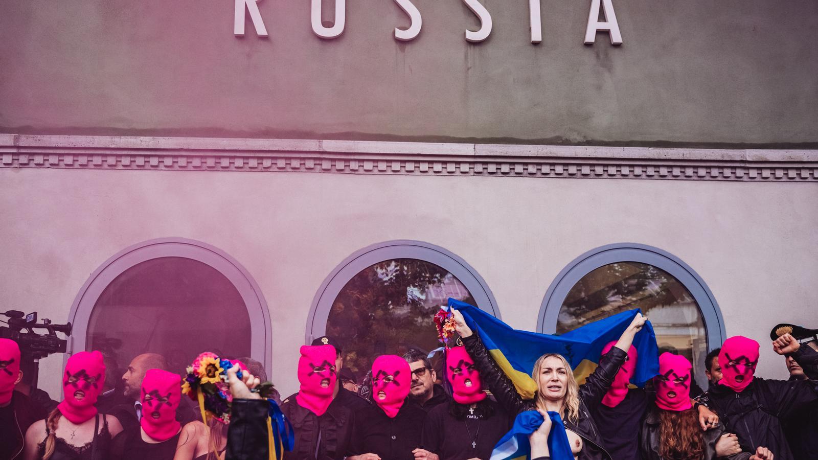 Members of Pussy Riot and Femen during the occupation of the Russian pavilion at the 61st Venice Art Biennale