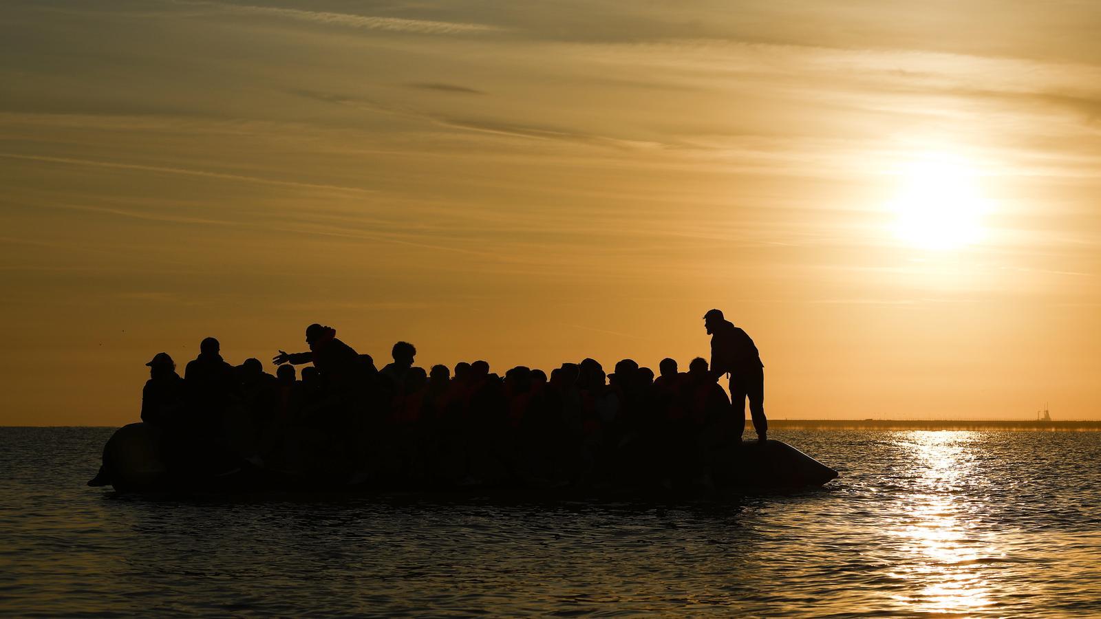 A group of migrants attempts to cross the English Channel to reach the United Kingdom and apply for asylum.