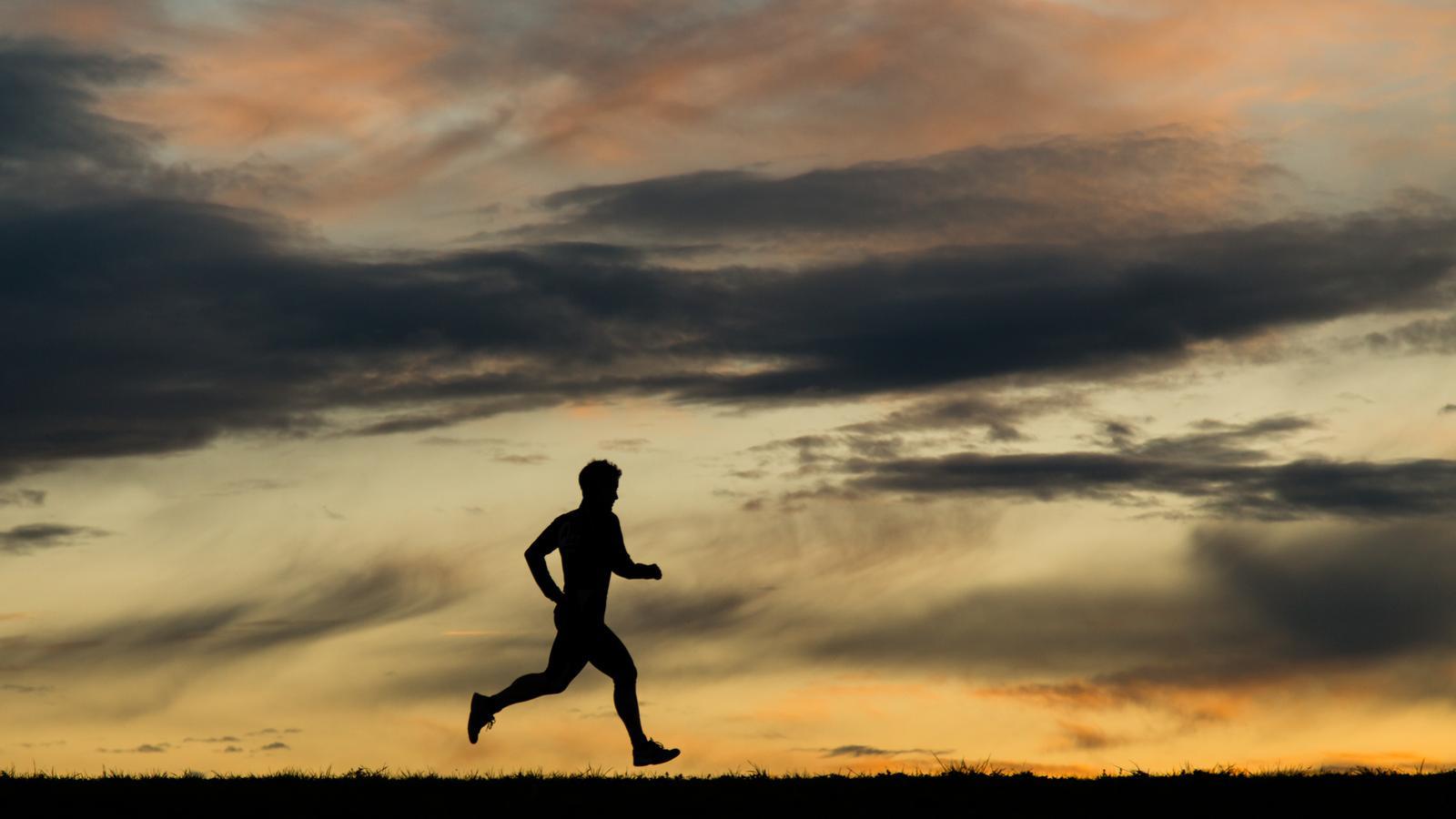 An athlete exercises outdoors.