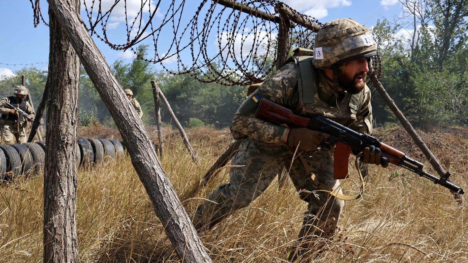 Ukrainian soldiers attend a military exercise near a front line in the Zaporizhia region.