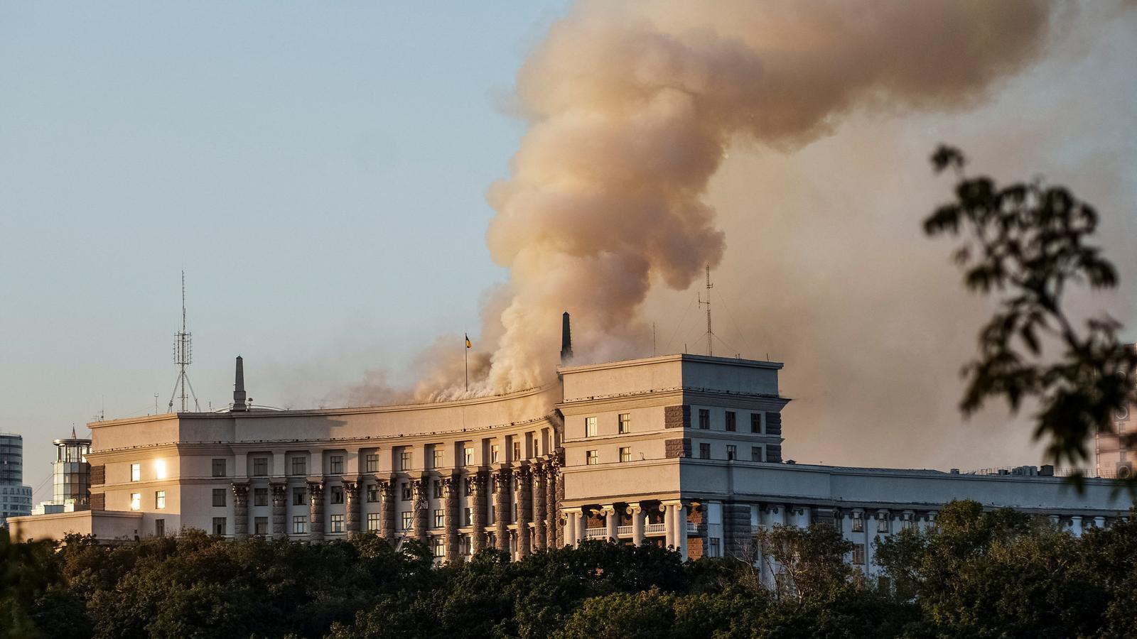 A column of smoke rises from the Ukrainian government headquarters following the Russian attack this morning.