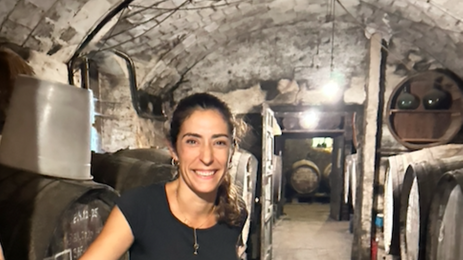 Montse Molla, from Mas Molla of Calonge, among the boots where she makes natural wines