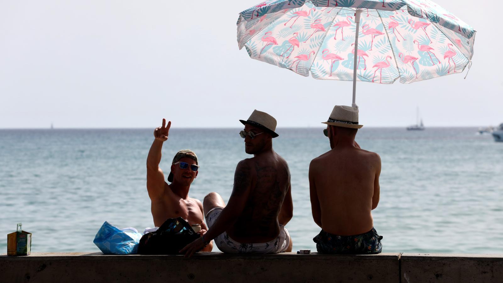 Tourists on the beach of Palma.