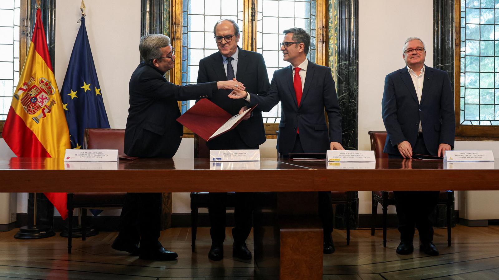 The president of the Spanish Episcopal Conference, Luis Argüello, the Ombudsman of Spain, Ángel Gabilondo, the Minister of the Presidency, Justice and Relations with the Courts, Félix Bolaños, and the president of the Spanish Conference of Religious, Jesús Díaz Sariego, after signing a protocol to recognize and compensate victims of clerical sexual abuse, in Madrid.