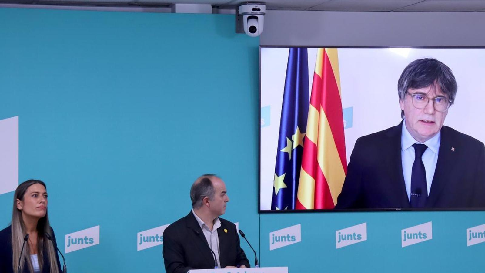 Míriam Nogueras, Jordi Turull, and Carles Puigdemont at a press conference last March.