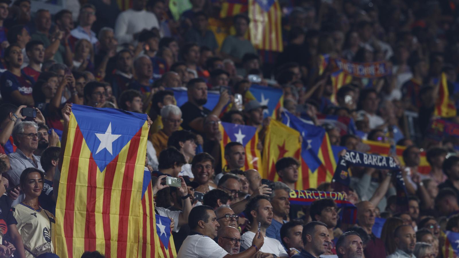 The FC Barcelona fans in the stands of the Camp Nou during the League match against Athletic Club.