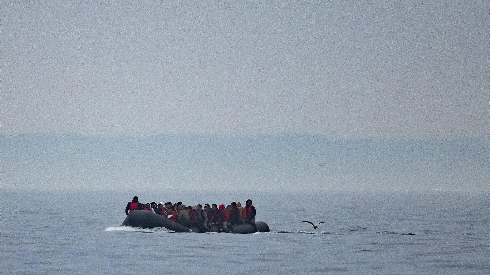 A small boat tries to cross the English Channel.