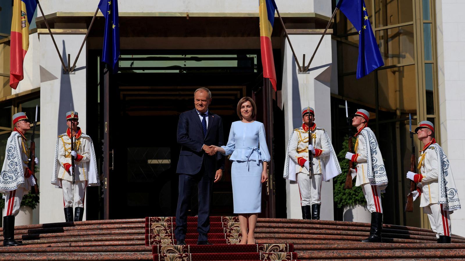 Polish Prime Minister Donald Tusk and Moldovan President Maya Sandu meet at the presidential palace in Chisinau on Wednesday.