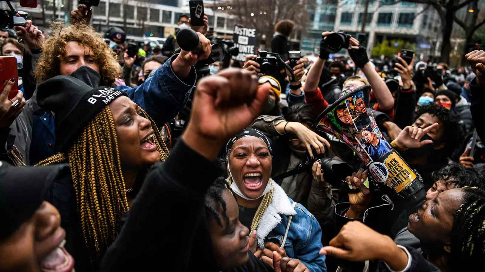 A group of people celebrating the verdict finding Derek Chauvin guilty in the death of George Floyd yesterday in Minneapolis.