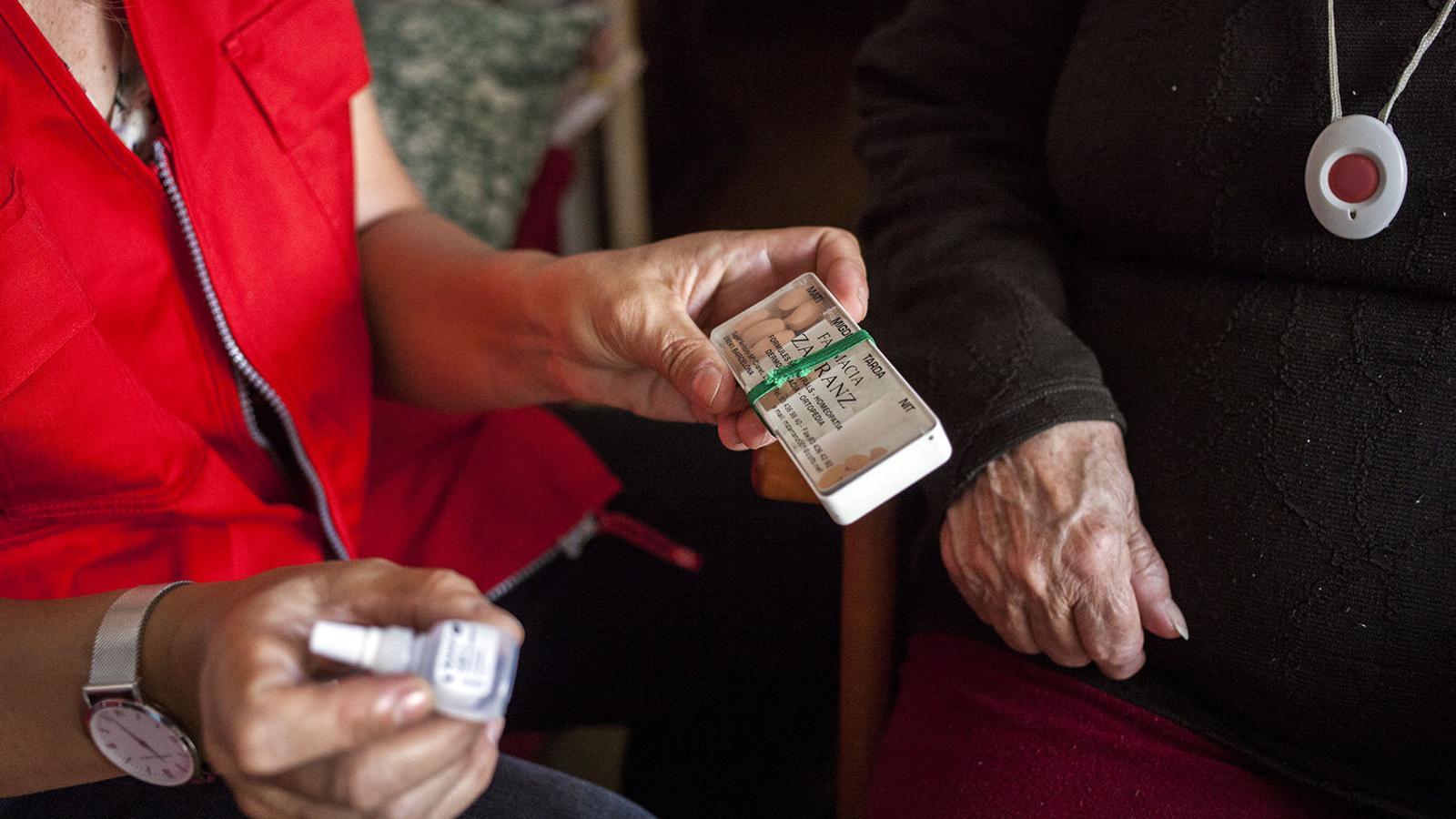 An elderly woman receives care at her home in a file image.