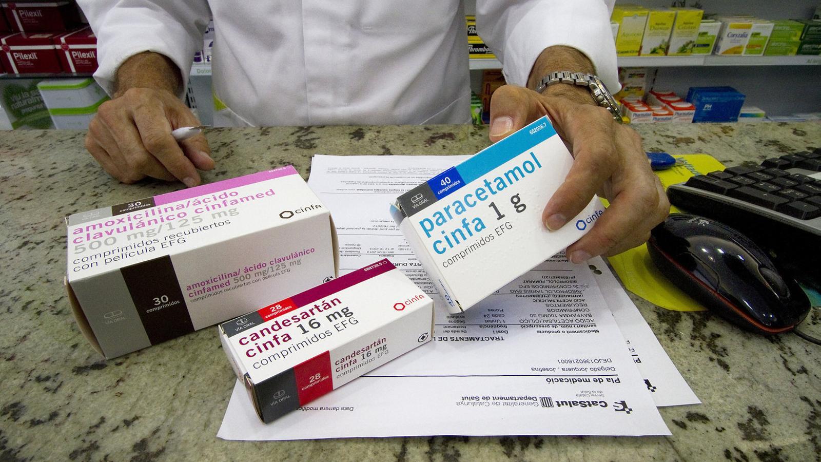 A pharmacist showing different medicines.