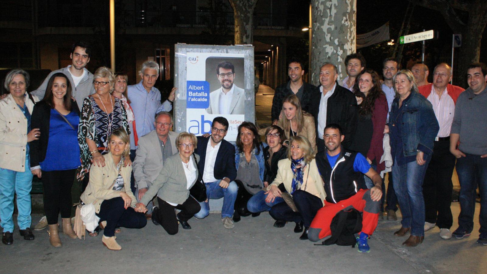 Enganxada de cartells de CiU