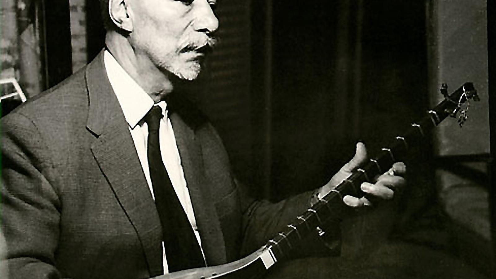 El místic Nur Ali Elahi amb un tanbur.