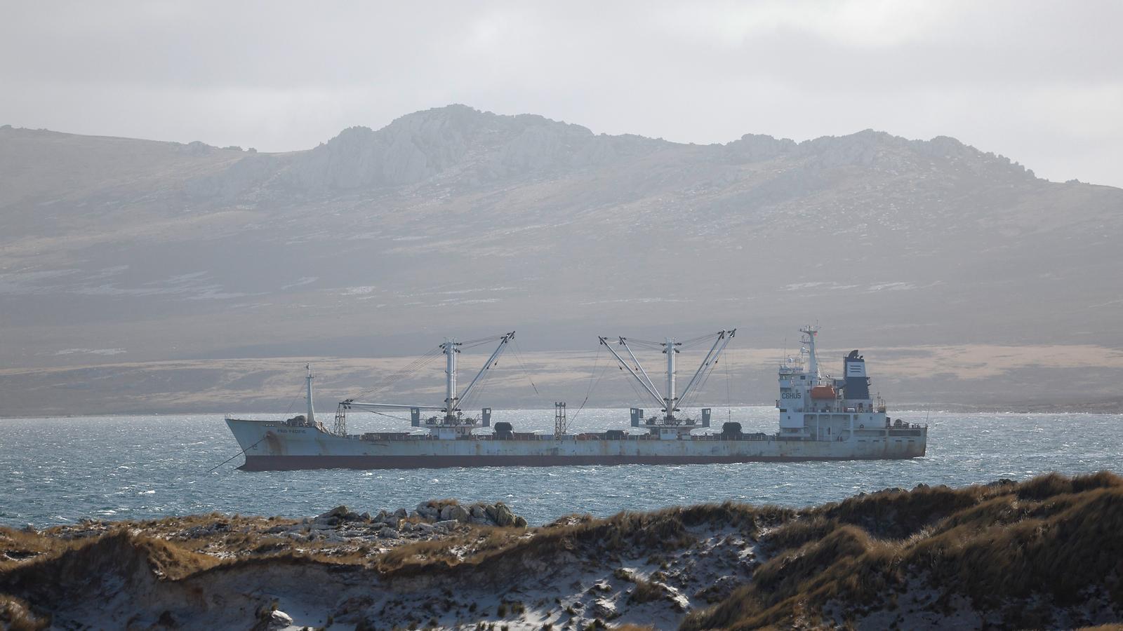 A ship sails through Yorke Bay, in the Falkland Islands.