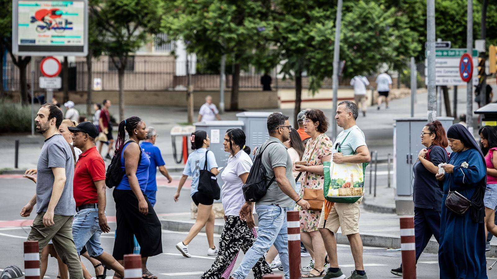 A group of pedestrians in Hospitalet de Llobregat.