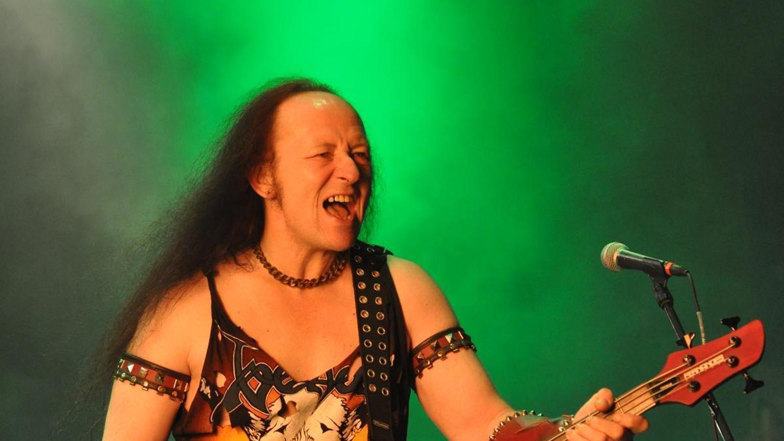 Conrad 'Cronos' Lant at a Venom concert in 2013.