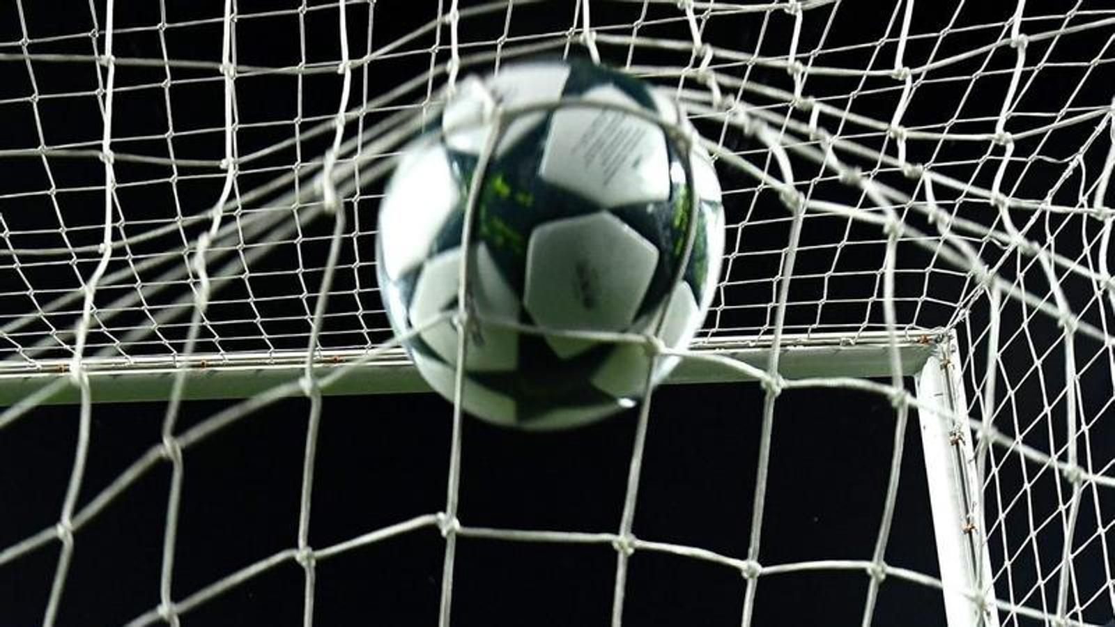 Arda Turan sending the ball into the net in one of his three goals against Borussia Mönchengladbach.