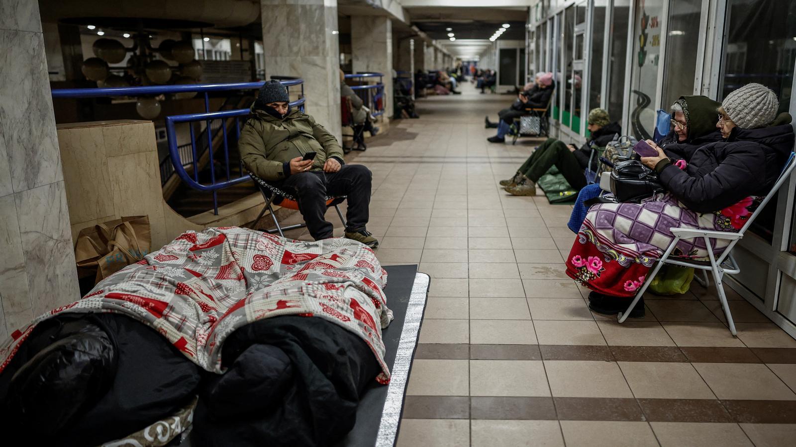 Kyiv residents take refuge in the subway during another Russian attack.