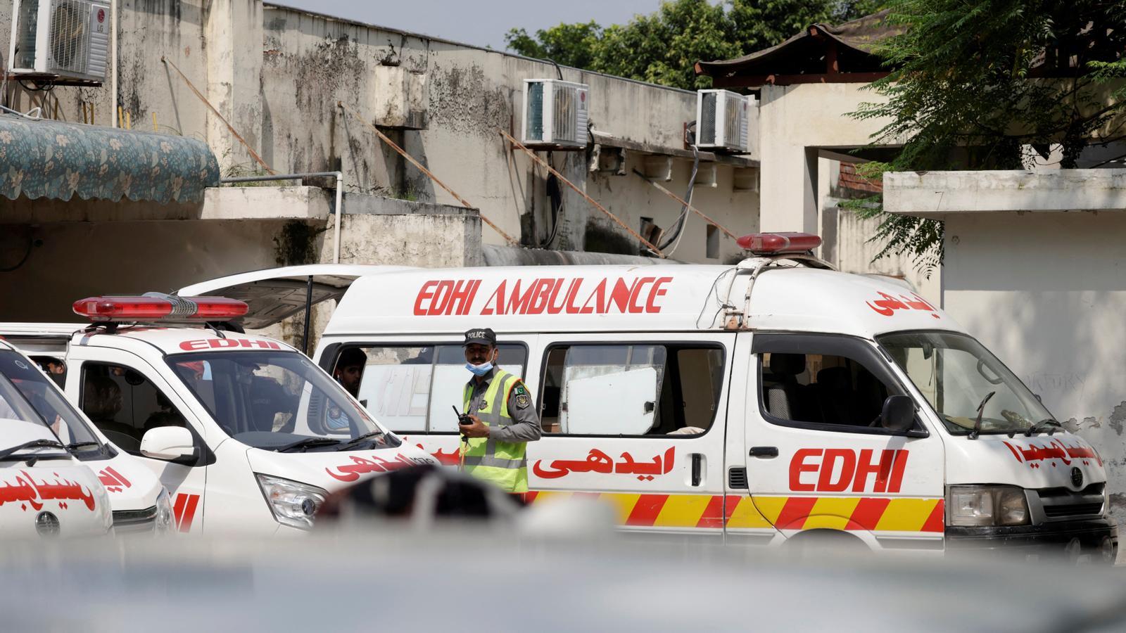 Ambulances parked in front of the hospital in Pakistan where at least 15 babies died from an explosion