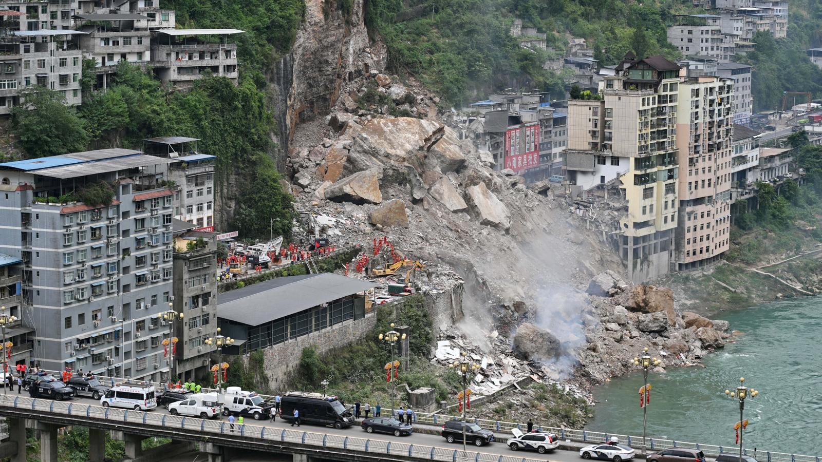 Rescue teams working on the banks of the Wujiang River