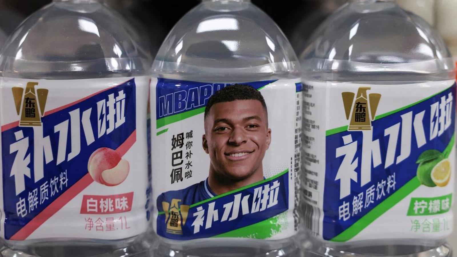 Eastroc Beverage drinks with the face of Kylian Mbappé, at a store in Beijing.