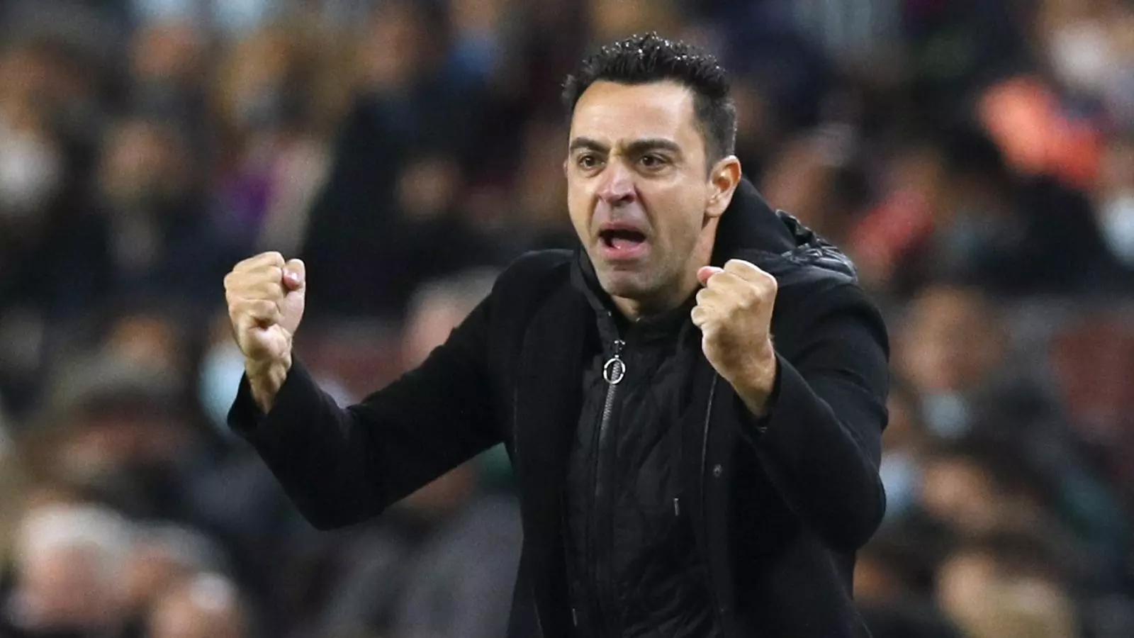 Xavi Hernández celebra el gol de Memphis