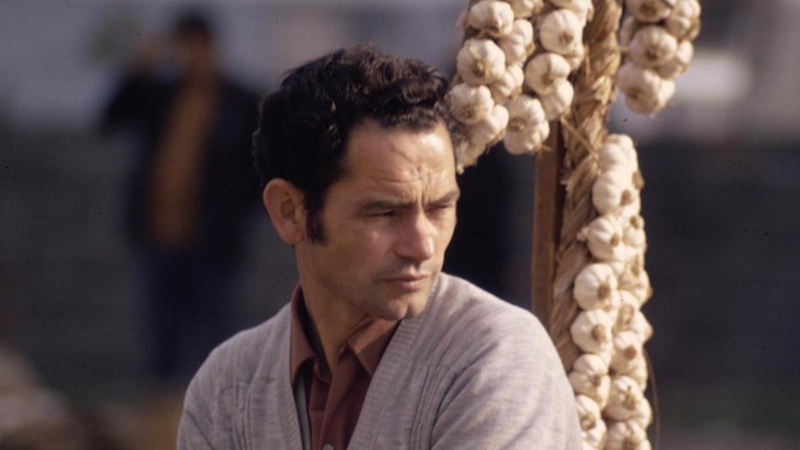 Garlic seller at the Lleó market in Girona.